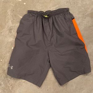 Under Armour athletic shorts. Size either small or medium, tag fell off.